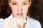 Nurse Holding Syringe Stock Photo