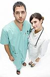 Nurse Standing With Surgeon Stock Photo