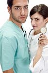 Nurse Standing With Surgeon Stock Photo