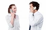 Office Executives Engaged Over A Phone Call Stock Photo