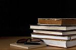 Old Book On Wooden Table Stock Photo