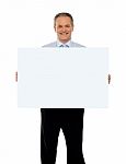 Old Businessman Holding Blank Board Stock Photo