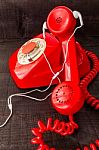 Old Landline Headphones Listening Through A Modern White Headpho Stock Photo