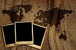 Old Photo Frame On World Map. Stock Photo