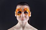 Orange And Red Rhinestones On A Girl Face Stock Photo