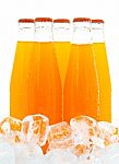 Orange Juice In Five Bottle Stock Photo