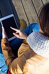 Outdoor Portrait Of Young Woman With Digital Tablet Stock Photo