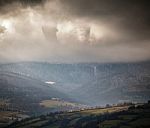 Overcast Scene In Cloudy Mountains. Autumn Rain Stock Photo