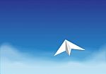 Paper Plane On The Bright Blue Sky Over The Cloud Stock Photo