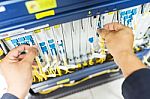 People Fix Node Fiber Optic In Network Room Stock Photo