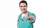 Physician Pointing To Camera Stock Photo