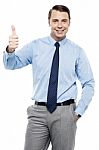 Picture Of A Male Executive Showing Thumbs Up Stock Photo