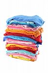 Pile Of Multiple Color Cloths On White Background Stock Photo