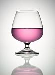 Pink Wine In Brandy Glass Stock Photo