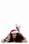 Pointing Girl Wearing Christmas Hat Stock Photo