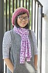 Portrait Of 40s Years Asian Woman Wearing Wool Hood And Silk Scarf Toothy Smiling With Happiness Emotion Stock Photo