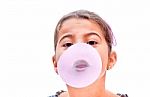 Portrait Of A Beautiful Little Girl Blowing Bubbles Stock Photo