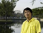 Portrait Of A Happy Man Thailand Park Stock Photo