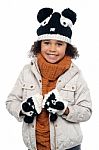 Portrait Of A Lovely Little Girl In Winter Outfit Stock Photo