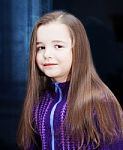 Portrait Of A Pretty Little Girl Near The Window Stock Photo