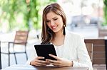 Portrait Of A Young Business Woman Using A Tablet Stock Photo