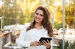 Portrait Of A Young Business Woman Using A Tablet Stock Photo