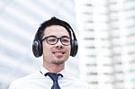 Portrait Of A Young Man Listening To Music Stock Photo