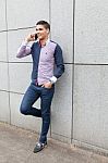 Portrait Of A Young Man With Talking On The Phone Stock Photo