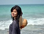 Portrait Of Asian Woman On Beach Stock Photo