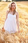 Portrait Of Beautiful Girl In Field Stock Photo