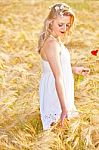 Portrait Of Beautiful Girl In Field Stock Photo