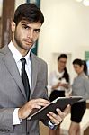 Portrait Of Business Man In An Office Environment Stock Photo