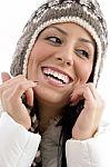 Portrait Of Cheerful Female With Woolen Cap Stock Photo