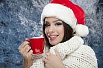 Portrait Of Girl In Santa Hats With The Cup Stock Photo