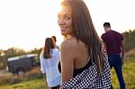 Portrait Of Group Of Friends Having Fun In Field Stock Photo