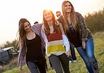 Portrait Of Group Of Friends Having Fun In Field Stock Photo