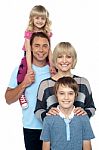 Portrait Of Happy Family Of Four People Stock Photo