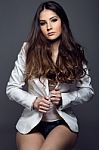 Portrait Of Pretty Young Woman Posing In The Studio Photo Stock Photo