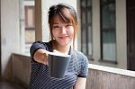 Portrait Of Thai Adult Beautiful Girl Drinking Coffee Stock Photo