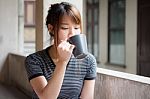 Portrait Of Thai Adult Beautiful Girl Drinking Coffee Stock Photo