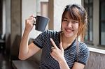 Portrait Of Thai Adult Beautiful Girl Drinking Coffee Stock Photo