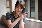 Portrait Of Thai Adult Beautiful Girl Drinking Coffee Stock Photo