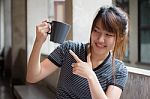 Portrait Of Thai Adult Beautiful Girl Drinking Coffee Stock Photo