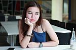 Portrait Of Thai Adult Beautiful Girl Read And Think In University Stock Photo