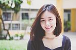 Portrait Of Thai Adult Beautiful Girl Relax And Smile Stock Photo