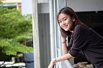 Portrait Of Thai Adult Beautiful Girl Relax And Smile Stock Photo