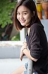 Portrait Of Thai Adult Beautiful Girl Relax And Smile Stock Photo