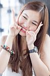 Portrait Of Thai Adult Beautiful Girl Relax And Smile Stock Photo