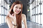 Portrait Of Thai Adult Beautiful Girl Relax And Smile Stock Photo