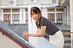 Portrait Of Thai Adult Beautiful Girl Relax And Smile Stock Photo